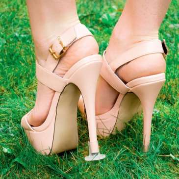 Clean Heels prevent your heels from sinking in grass